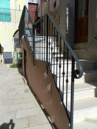 Renovated stairs leading to entrance